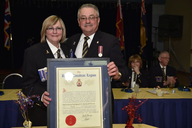 Donna Sampson & Brian Weaver, President of the Ontario Command, with the official document for Branch 643 - Photo by Jose Atencia Ocadio.